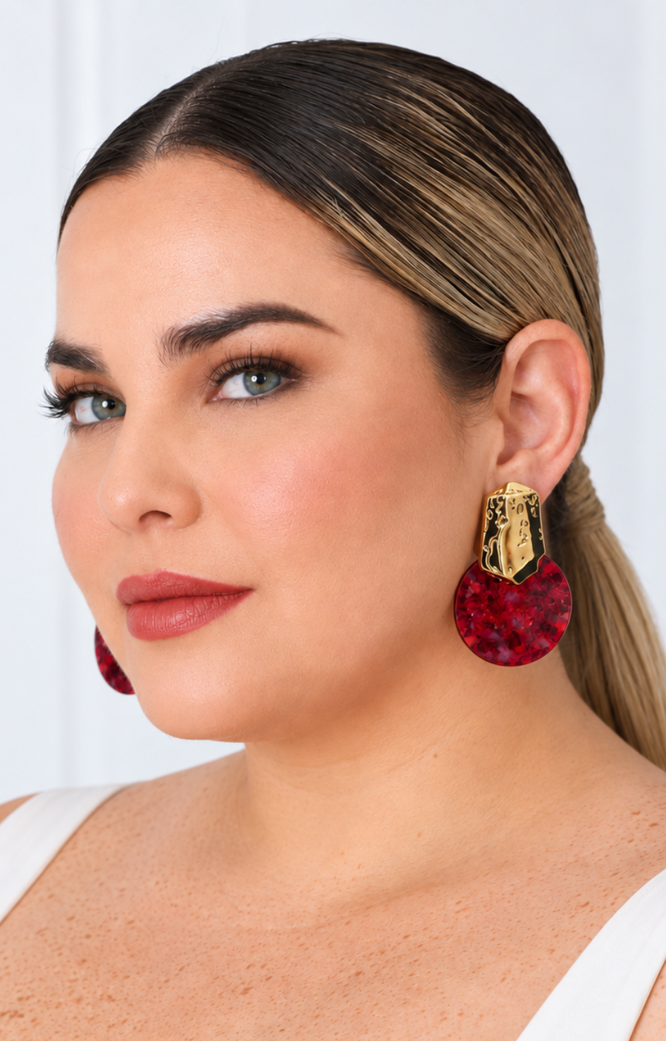 Aretes colgantes con disco de acetato