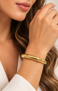 Brazalete rígido dorado estilo bambú