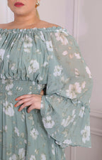 Vestido verde con hombros descubiertos