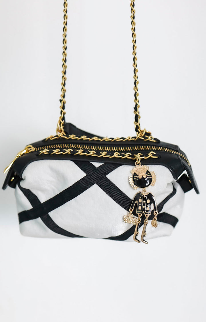 Mini bolso blanco con muñeco - Boutiquemirel